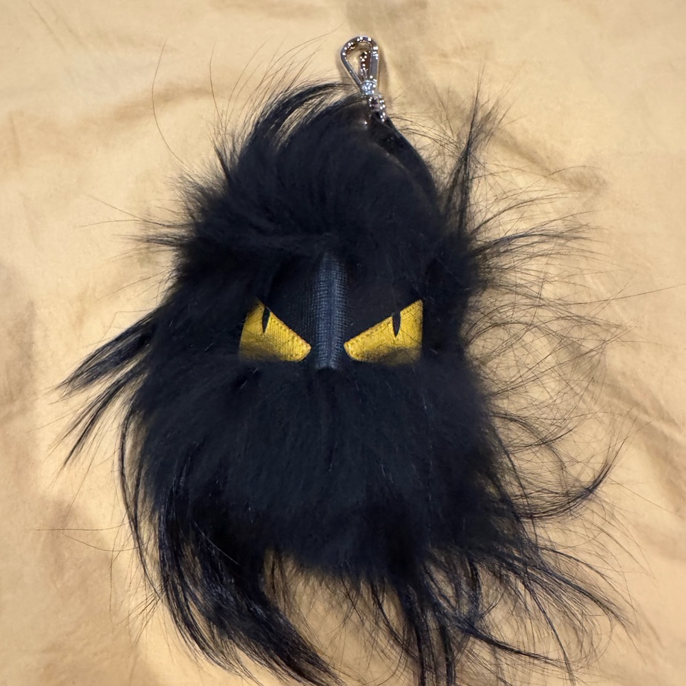 EMILY IN PARIS goes FENDI

Fendi Black Fur Keychain with Yellow Accents